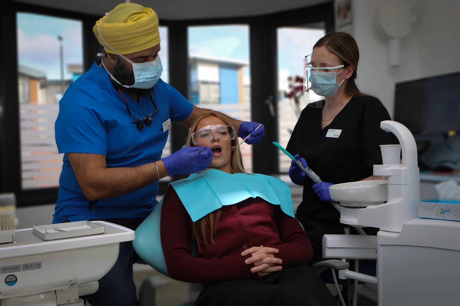 Maypole dental clinicians performing a comprehensive bridge assessment and treatment planning.
