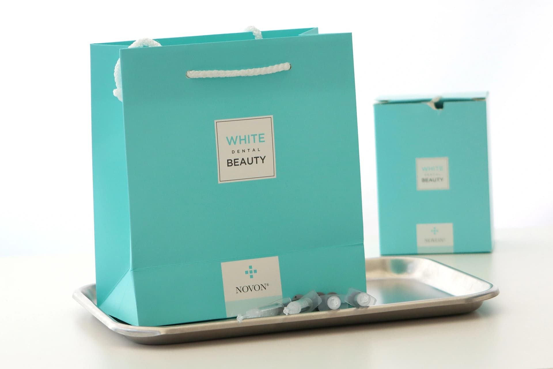 Professional tooth whitening kit with custom trays and gel.